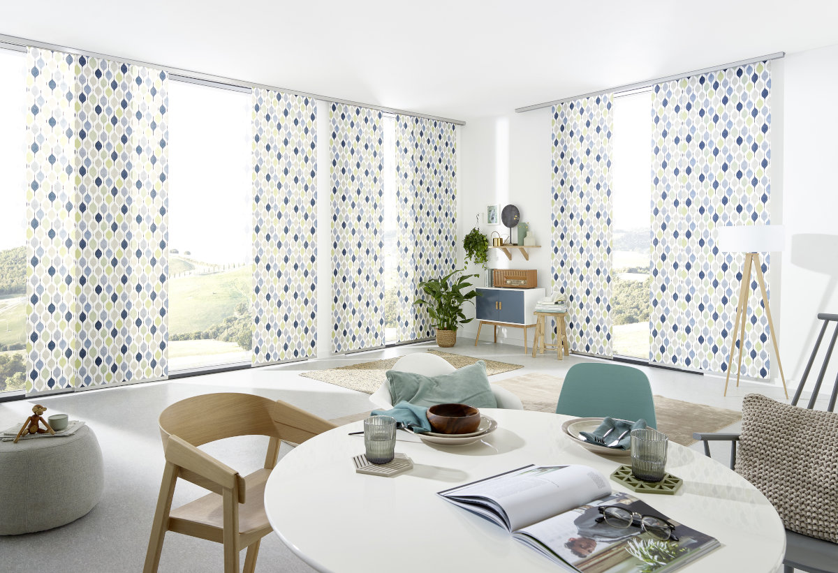 Foto von Esszimmer - sehr hell und sonnig mit stylische Vorhänge